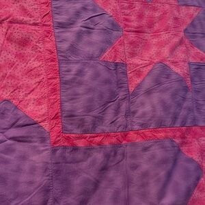 Elegant Purple and Pink Star Quilt